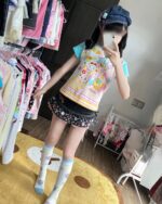 Person wearing a Mezzo Piano Print Top - Jojifuku Aesthetic.