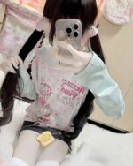 Long Sleeves Mezzo Piano T-Shirt with floral and character print design.