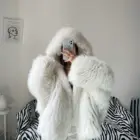 White Thick Fluffy Faux Fur Coat with hood, showing texture and detail.
