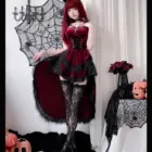 Woman wearing a Dark Nun Dress, burgundy corset and skirt with lace stockings and devil horns.