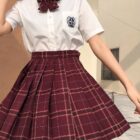 A burgundy JK Plaid Skirt, pleated design, part of the Summer Plaid Skirt Collection.