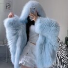 Light blue Thick Fluffy Faux Fur Coat with a hood, showcasing its plush texture.