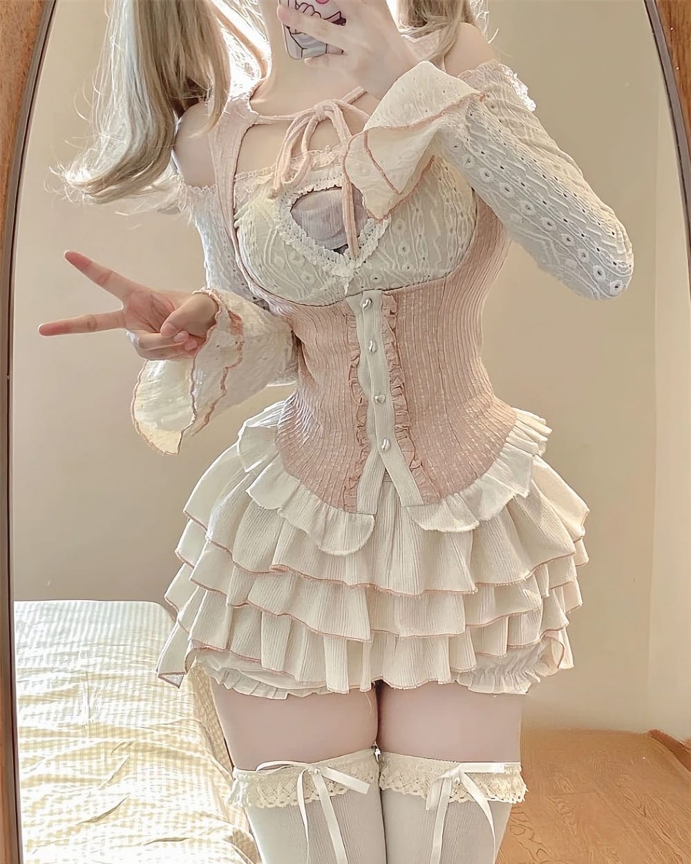 Ruffled Pink Dress Set - Dollette Aesthetic product photo 1 Ruffled pink Dollette Aesthetic Dress set with corset and layered skirt. Lace details and long sleeves.