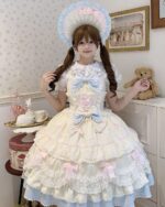 A woman wearing a Frilly Ribbon Dress - Hime Lolita Dress, featuring layered ruffles and bows.