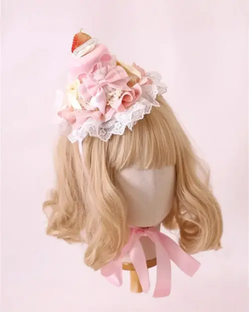 Sweet Lolita Hairpin displayed on a mannequin head, featuring ruffles and floral accents.