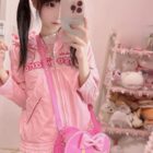 Pink Heart Shaped Cross Body Bag - Jojifuku aesthetic carried by a person.