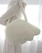 Close-up of a white Fluffy Angel Wings Bag, Harajuku aesthetic.