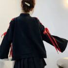 Black Kitsune Bowed Sweatshirt with red ribbon sleeves and a pleated skirt.