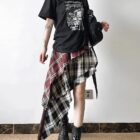Patched plaid Grunge Aesthetic Skirt, layered with a distressed aesthetic.