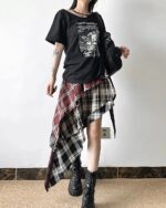 Patched plaid Grunge Aesthetic Skirt, layered with a distressed aesthetic.