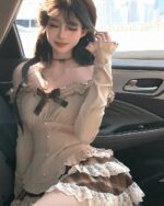 Ruffled Brows Skirt and Top - Coquette aesthetic outfit featuring a cream blouse and plaid skirt.