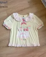 Cream-colored Lolita Skirt Top Set featuring a cute kitten print and ruffles.