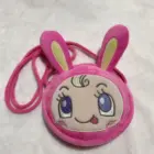 Pink Mezzo Piano Cross Body Bag featuring a rabbit face design and adjustable strap.