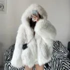 White Thick Fluffy Faux Fur Coat with a hood and attached pockets.