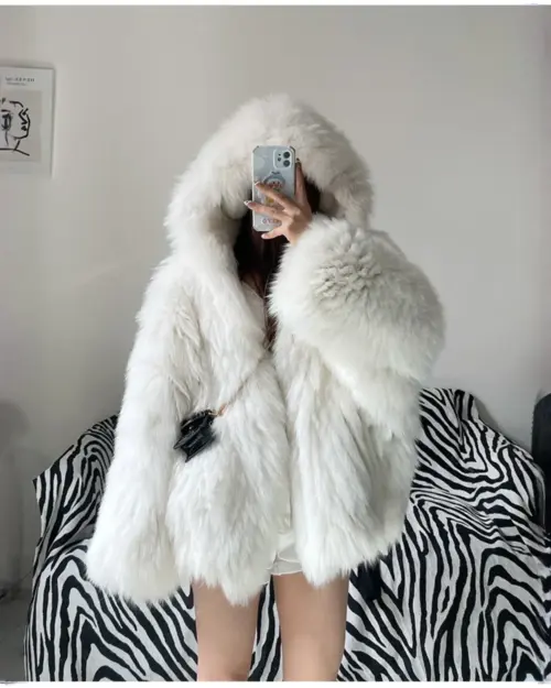 White Thick Fluffy Faux Fur Coat with a hood and attached pockets.
