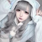 Model wearing a light blue Kawaii Gamer Hoodie. Cute, comfortable apparel.