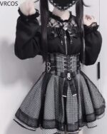 Black Jirai Kei Clothing Set: A black top and skirt outfit with lace, ruffles, and a corset belt.