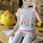 Sugarbunnies T-Shirt featuring a Jojifuku aesthetic design with cute animal characters and pastel colors.