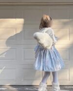 Fluffy Angel Wings Bag - Harajuku Aesthetic, a white plush bag worn by a model.