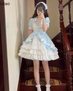 A light blue Hime Lolita Dress Collection with ruffles and lace details, worn by a person.