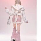 Model wearing The Fluffy Bunny Set - Coquette Aesthetic, featuring a hooded jacket and high-waisted skirt.
