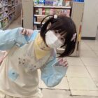 Model wearing a Kawaii Panda Pastel Long Sleeve T-Shirt from Jojifuku Aesthetic.