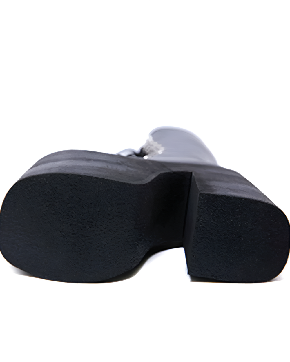 Sole of black Abyss Lace-Up Stompers, a pair of goth platform boots with a thick rubber heel.