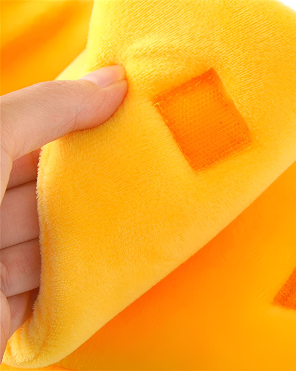 Close-up of a yellow Banana Cat Bed, a cute cat beds, showing plush fabric texture.