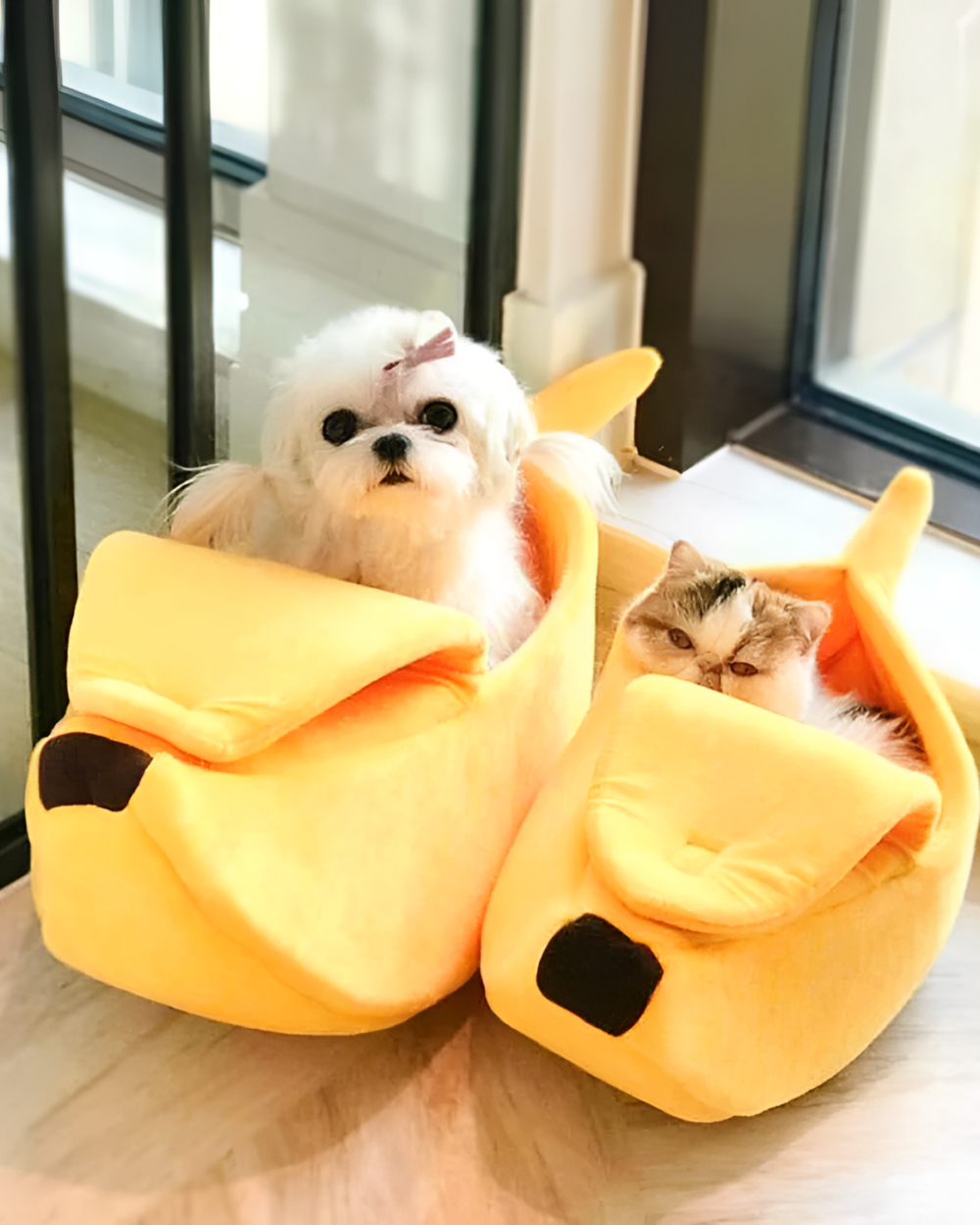Yellow Banana Cat Bed with a dog and cat inside. Cute cat beds for pets.