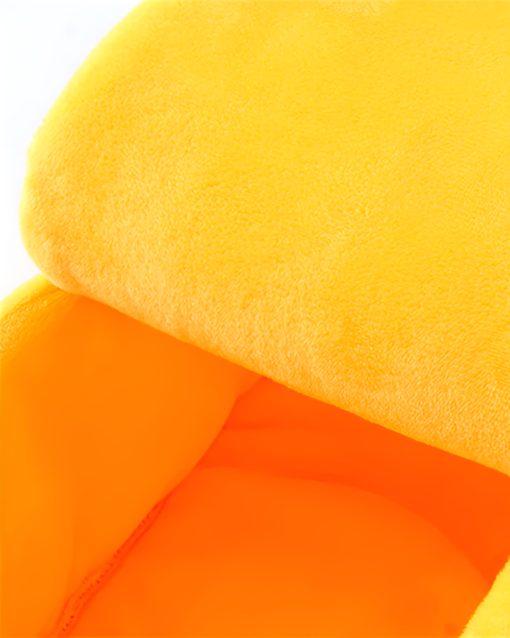 Close-up of a yellow cute cat beds, plush material, designed for cats.