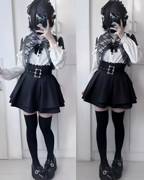 Model wearing the Bloodmoon Corset Coord, showcasing a Jirai Kei aesthetic with a black skirt, white blouse & eyelet details.