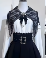 Black and white Bloodmoon Corset Coord with lace details, embodying the Jirai Kei aesthetic. Includes a blouse, skirt, and belt.