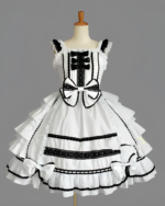 Black and white Hime Lolita dress with ruffled skirt and lace details displayed on a mannequin.