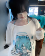 Model wearing a Blue Cat Girl T-Shirt featuring a kawaii anime character design.