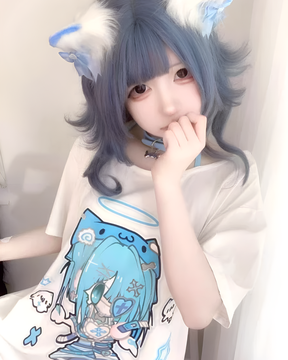 Person wearing a Blue Cat Girl T-Shirt with a Yami Kawaii aesthetic design.