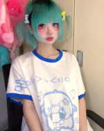 Person wearing a Blue Girl T-Shirt with a cute anime design.