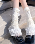 White ruffled leg warmers with bows, Hime Gyaru aesthetic style.