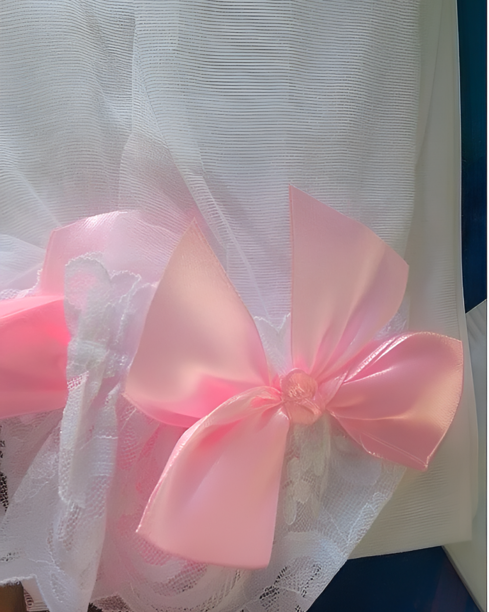 Pink Bowknot Thigh Highs detail featuring a satin bow and lace trim.