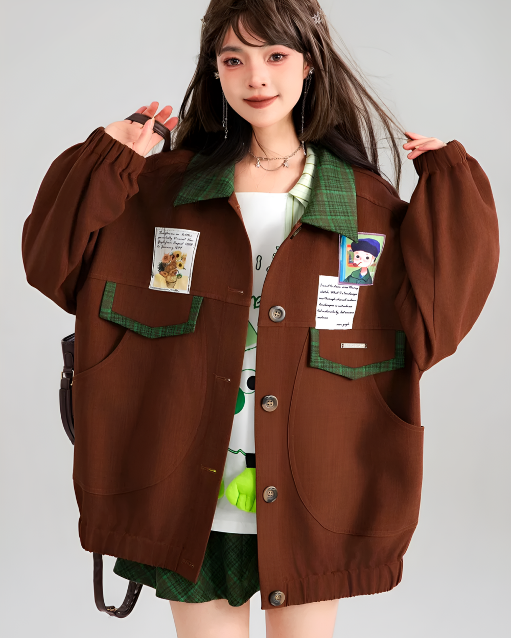 Brown corduroy jacket with patches and buttons, preppy style.