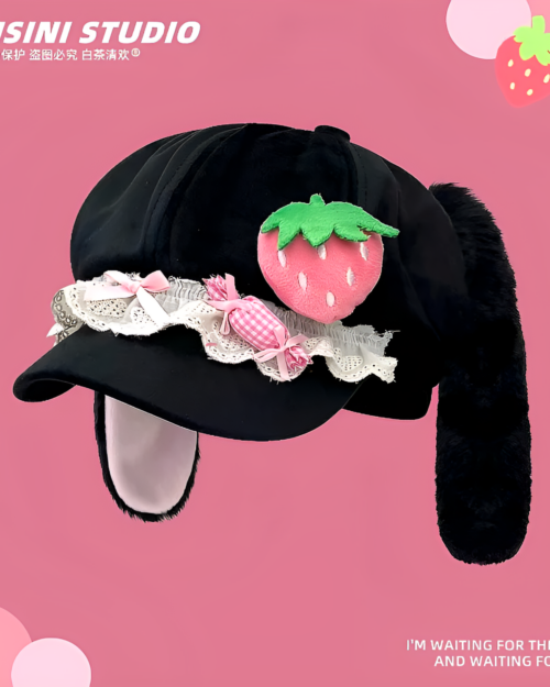 COISINI STUDIO strawberry bunny cap black hat with ear warmers and strawberry decoration.