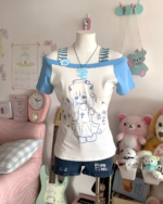 Cat Girl Nurse T-Shirt featuring a cute anime design with paw prints and accessories.