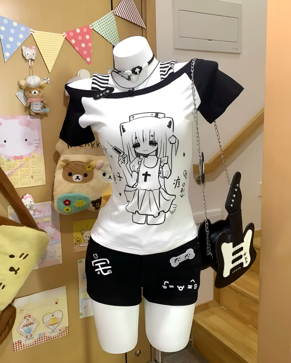 Black Cat Girl Nurse T-Shirt displayed on a shelf with accessories.