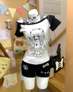 Black Cat Girl Nurse T-Shirt displayed on a shelf with accessories.