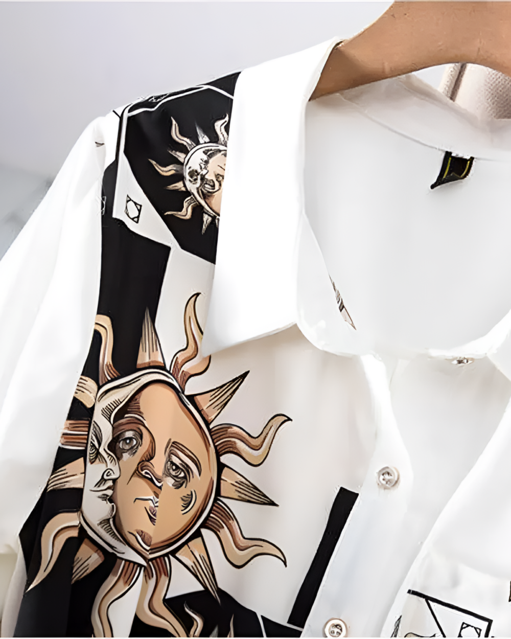 Close-up of the Celestial Dress - Witchcore Aesthetic featuring a sun and moon print on a white shirt style dress.