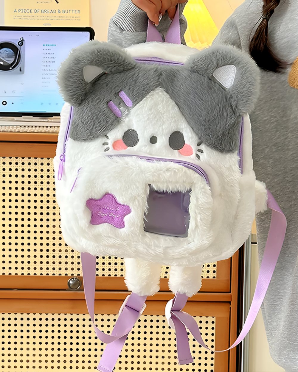 Gray chibi plush backpack with a lavender star and adjustable straps. This Jojifuku aesthetic bag provides a cute and functional design.