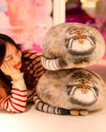 Chonky Realistic Palla's cat plush toy displayed with a person, showcasing its soft texture and design.