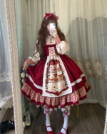 Woman wearing the Crimson Hood Berry Bear OP Set, featuring a red and white colorblock design with a bear print. This Berry Bear OP is part of a Lolita fashion set.