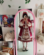 Crimson Hood Berry Bear OP set displayed on a mannequin with a matching bag and socks. This Berry Bear OP features a red hood and a cream-colored dress.