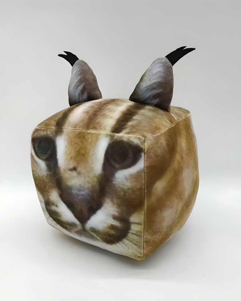 A Cube Floppa plushie featuring a realistic cat face print on a cube shape.
