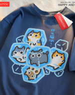 Close-up of a red cutecore cat shirt featuring a cartoon image of cats in ice cubes.